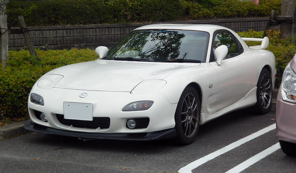 This image has an empty alt attribute; its file name is 1024px-tuned_mazda_rx-7_type_rb_gf-fd3s_front.jpg